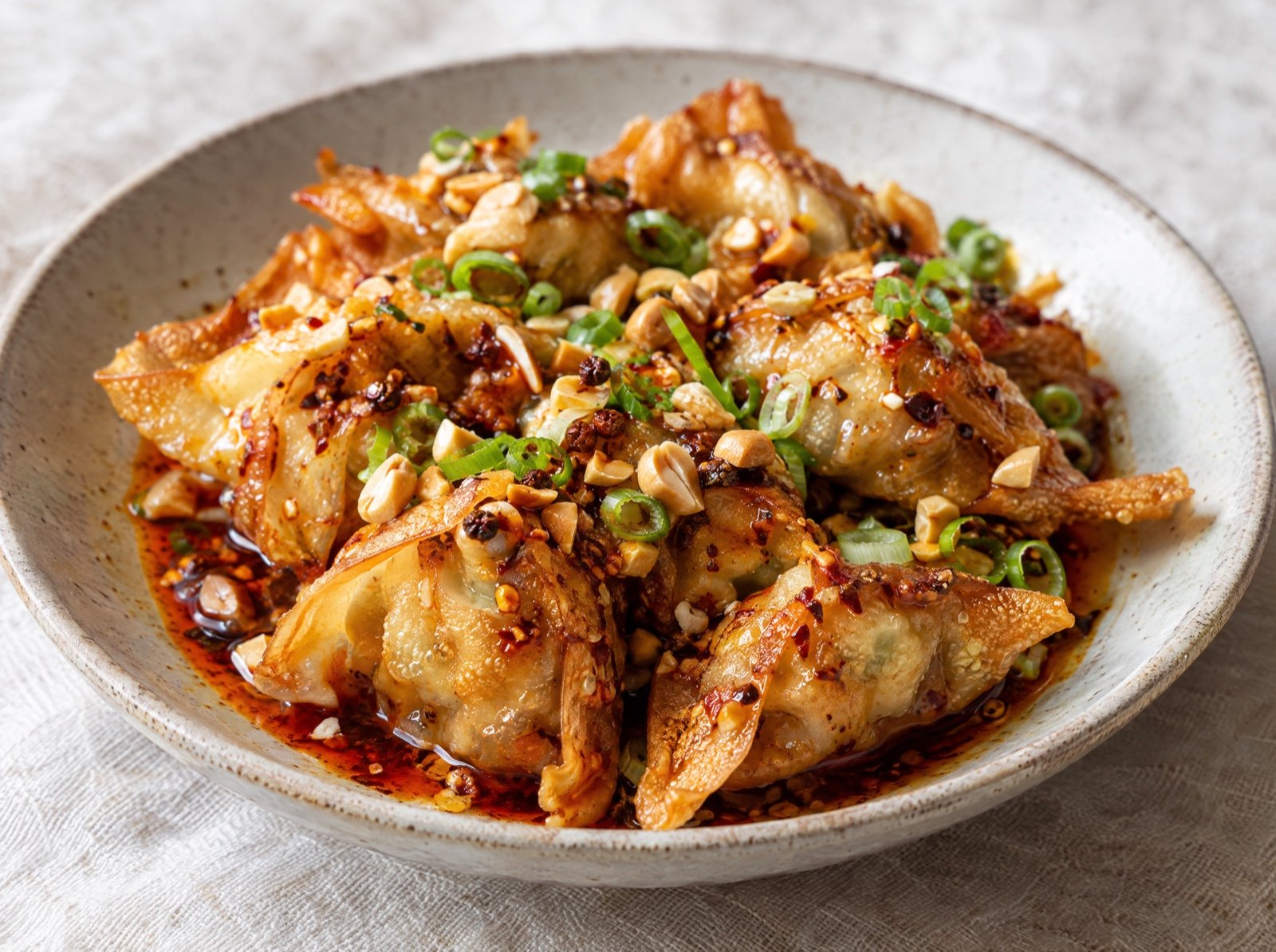 Spicy Sichuan Chili Wontons with Peanuts